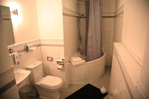 Triple with private facilities